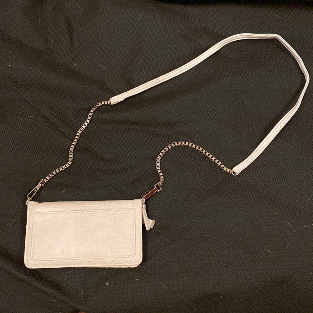 Calvin Klein small cross body purse. With lots of card and phone storage.